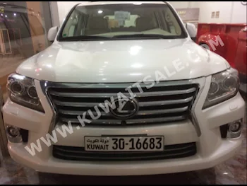 Lexus  570  LX  2014  26,000  Sedan  Tiptronic  8  Leather  4WD  Pearl  Gasoline