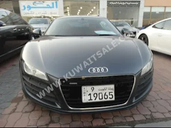 اودي  آر 8  2008  52,000  كوبيه \ سبورت  اتوماتك  10  جلد  دفع خلفي  رمادي  بنزين