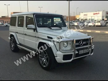 مرسيدس - بنز  500  جي - كلاس  2008  200,000  اس يو في  اتوماتك  8  جلد  دفع رباعي  أبيض  بنزين