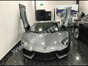 لمبرجيني  LP 700-4  أفانتادور  2012  17,000  كوبيه \ سبورت  اف - 1  12  شامواه  دفع خلفي  رمادي مطفي  بنزين