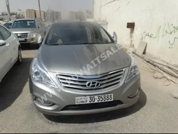 Hyundai  Azera  2014  76,000  Sedan  Automatic  6  Leather  FWD  Bronze  Gasoline