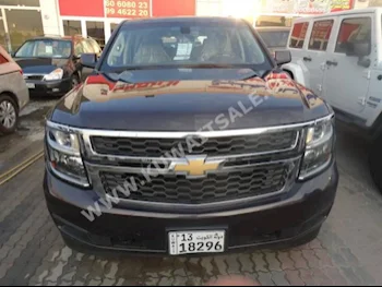 Chevrolet  LS  Tahoe  2015  60,000  SUV  Automatic  8  Cloth  RWD  Brown  Gasoline