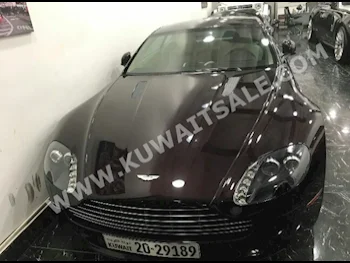 أستون مارتن  فانتج  2012  36,000  كوبيه \ سبورت  اتوماتك  12  جلد  دفع خلفي  بني  بنزين