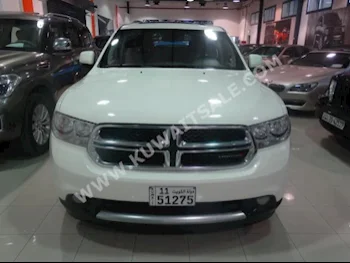 دودج  كرو  دورانغو  2011  87,000  اس يو في  اتوماتك  8  مخمل  دفع رباعي  أبيض  بنزين