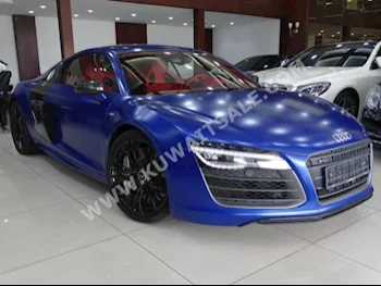 اودي  آر 8  2015  24,000  كوبيه \ سبورت  تبترونك  8  جلد  دفع خلفي  ازرق  بنزين
