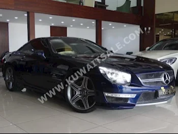 مرسيدس - بنز  63 AMG  اس ال - كلاس  2013  15,000  كوبيه \ سبورت  اتوماتك  8  جلد  دفع خلفي  أزرق غامق  بنزين