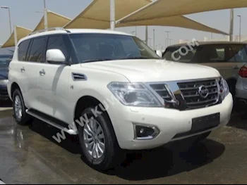 Nissan  SE  Patrol  2014  36,000  SUV  Automatic  8  Leather  4WD  White  Gasoline