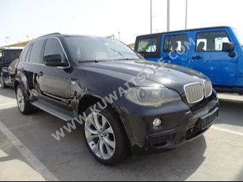 BMW  5  X-Series  2010  103,000  SUV  Automatic  8  Leather  4WD  Black  Gasoline