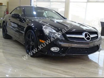 Mercedes-Benz  550  SL-Class  2009  68,000  Coupe / Sport  Automatic  8  Leather  RWD  Black  Gasoline