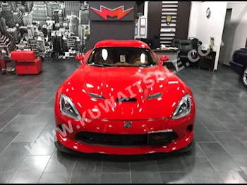 دودج  جي تي اس  فايبر  2013  15  كوبيه \ سبورت  عادي  10  جلد  دفع خلفي  أحمر  بنزين