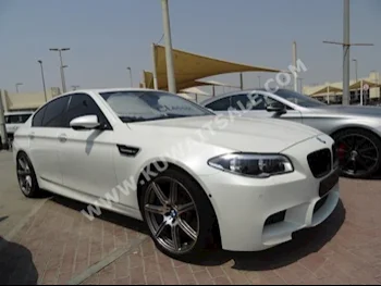 BMW  5  M-Series  2012  92,000  Sedan  Automatic  8  Leather  RWD  White  Gasoline