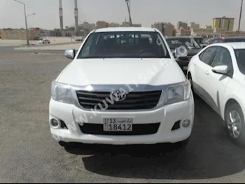 Toyota  Hilux  2015  70,000  Pick Up  Manual  4  Cloth  4WD  White  Gasoline