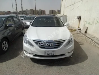 Hyundai  Sonata  2015  100,000  Sedan  Automatic  4  Leather  FWD  White  Gasoline