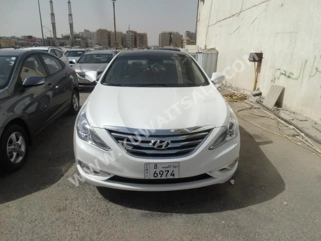 Hyundai  Sonata  2015  100,000  Sedan  Automatic  4  Leather  FWD  White  Gasoline