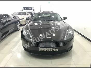 أستون مارتن  9  دي بي  2013  570,000  كوبيه \ سبورت  اتوماتك  12  جلد  دفع خلفي  بني  بنزين