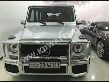 مرسيدس - بنز  55 AMG  جي - كلاس  2008  141,000  اس يو في  اتوماتك  8  جلد  دفع رباعي  رصاصي  بنزين