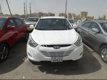 Hyundai  Tucson  2015  60,000  SUV  Automatic  4  Cloth  FWD  White  Gasoline