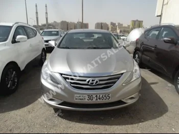 Hyundai  Sonata  2014  68,000  Sedan  Automatic  4  Cloth  FWD  Silver  Gasoline