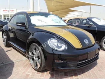 Volkswagen  Beetle  2015  9,000  Hatchback  Automatic  4  Leather  RWD  Black  Gasoline
