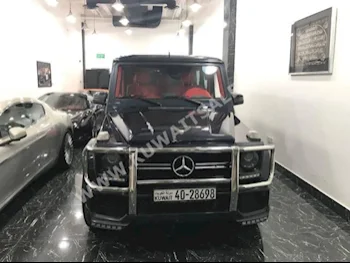 مرسيدس - بنز  55 AMG  جي - كلاس  2009  218,000  اس يو في  اتوماتك  8  جلد  دفع رباعي  أزرق غامق  بنزين