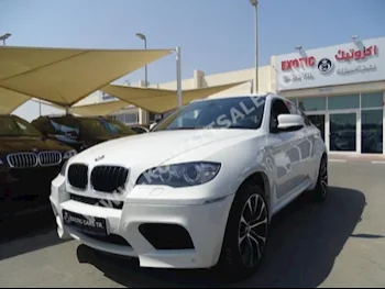BMW  6 M  X-Series  2010  68,000  SUV  Automatic  8  Leather  4WD  White  Gasoline