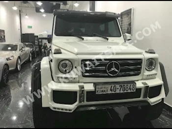 مرسيدس - بنز  500  جي - كلاس  2017  9,000  اس يو في  اتوماتك  8  جلد  دفع رباعي  أبيض  بنزين