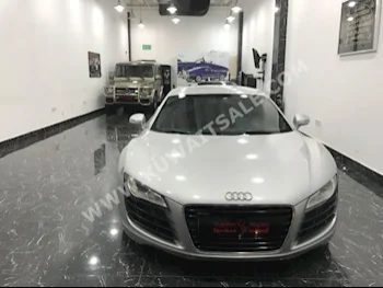 اودي  آر 8  2009  170,000  كوبيه \ سبورت  اتوماتك  8  جلد  دفع خلفي  فضي  بنزين