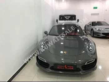 بورش  توربو  911  2014  83,000  كوبيه \ سبورت  اتوماتك  8  جلد  دفع خلفي  رمادي  بنزين