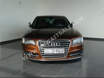 Audi  8  S  2014  45,000  Sedan  Automatic  8  Leather  4WD  Tan  Gasoline
