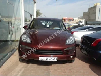 Porsche  S  Cayenne  2011  100,000  SUV  Automatic  6  Leather  4WD  Brown  Gasoline
