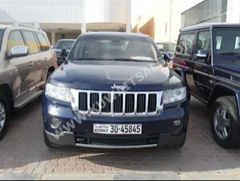 Jeep  Limited  Grand Cherokee  2013  130,000  SUV  Automatic  8  Leather  4WD  Dark Blue  Gasoline