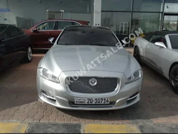 Jaguar  L  XJ  2012  70,000  Sedan  Automatic  6  Leather  RWD  Silver  Gasoline