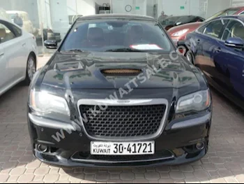 Chrysler  SRT8  300C  2013  100,000  Sedan  Automatic  8  Cloth  RWD  Black  Gasoline