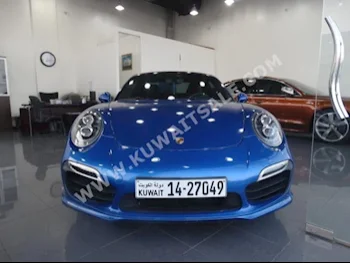 Porsche  Turbo S  911  2014  33,000  Coupe / Sport  Automatic  6  Leather  RWD  Blue  Gasoline