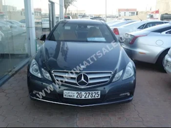 Mercedes-Benz  250  E-Class  2011  80,000  Coupe / Sport  Automatic  4  Leather  RWD  Gray  Gasoline