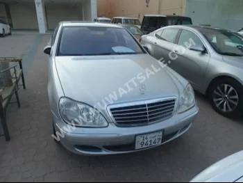 Mercedes-Benz  500  S-Class  2005  96,000  Sedan  Automatic  8  Leather  RWD  Silver  Gasoline