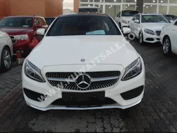 مرسيدس - بنز  250  سي - كلاس  2017  13,000  كوبيه \ سبورت  اتوماتك  4  جلد  دفع خلفي  أبيض  بنزين