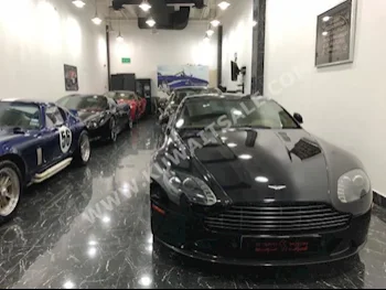 أستون مارتن  فانتج  2011  49,000  كوبيه \ سبورت  اتوماتك  8  جلد  دفع خلفي  أسود  بنزين