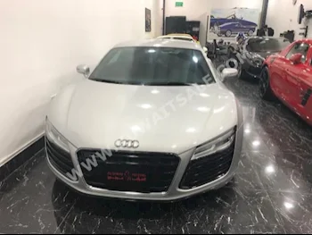 اودي  آر 8  2015  34,000  كوبيه \ سبورت  اتوماتك  8  جلد  دفع رباعي  فضي  بنزين
