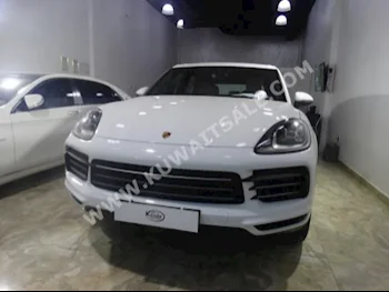 بورش  كيان  2018  0  اس يو في  اتوماتك  6  جلد  دفع رباعي  أبيض  بنزين
