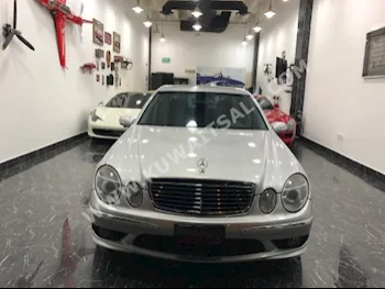 مرسيدس - بنز  55 AMG  اي - كلاس  2006  85,000  سيدان  اتوماتك  4  جلد  دفع خلفي  فضي  بنزين