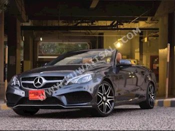 Mercedes-Benz  320  E-Class  2015  35,000  Coupe / Sport  Automatic  6  Leather  RWD  Gray  Gasoline
