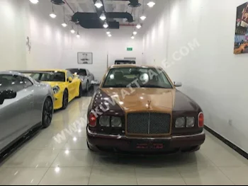 بنتلي  أرناج  2004  91,000  سيدان  اتوماتك  12  جلد  دفع خلفي  عنابي  بنزين