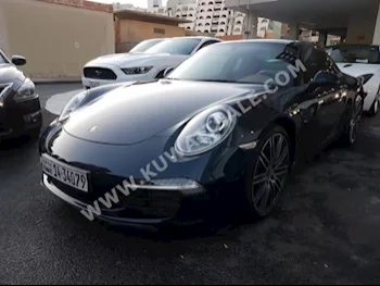 بورش  كاريرا  911  2015  40,000  كوبيه \ سبورت  اتوماتك  6  جلد  دفع خلفي  أزرق غامق  بنزين