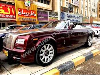 رولز - رويس  دروب هيد  2013  13,000  كوبيه \ سبورت  اتوماتك  12  مخمل  دفع خلفي  عنابي  بنزين