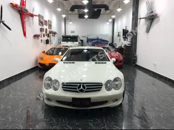 مرسيدس - بنز  350  اس ال - كلاس  2006  130,000  كوبيه \ سبورت  اتوماتك  6  جلد  دفع خلفي  أبيض  بنزين