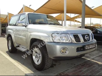 Nissan  Safari VTEC  Patrol  2015  147,000  SUV  Automatic  6  Cloth  4WD  Silver  Gasoline