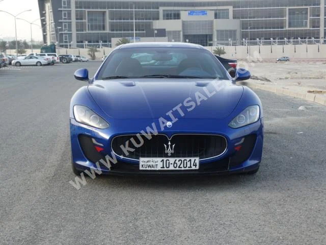 Maserati  MC Stradale  2012  37,000  Coupe / Sport  Automatic  8  Chamois  RWD  Blue  Gasoline