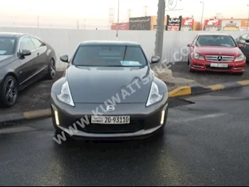 نيسان  370  زد  2013  133,000  كوبيه \ سبورت  عادي  6  جلد  دفع خلفي  رمادي  بنزين