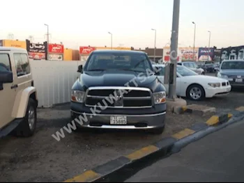 دودج  1500  رام  2012  165,000  بيكب  اتوماتك  8  جلد  دفع رباعي  أسود  بنزين